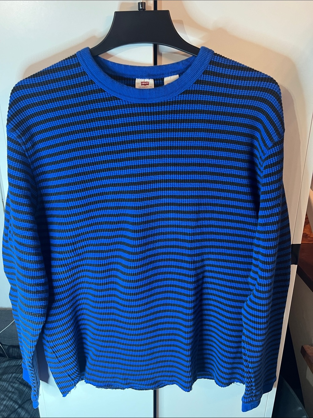 Levi’s blue thermal.